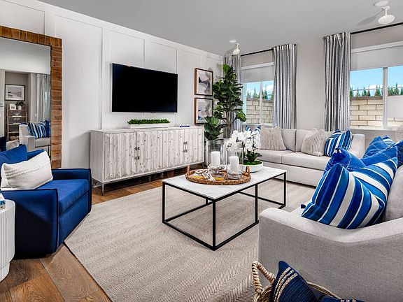 A photo of the great room in the Row Plan 6 model home.