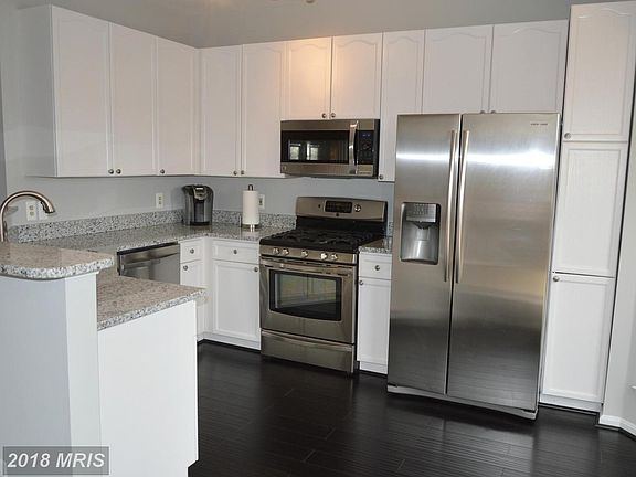 New Granite, HW Flooring, SS Appliances