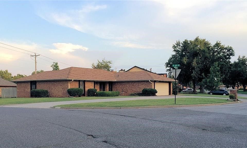 Stunning corner lot with circle driveway.