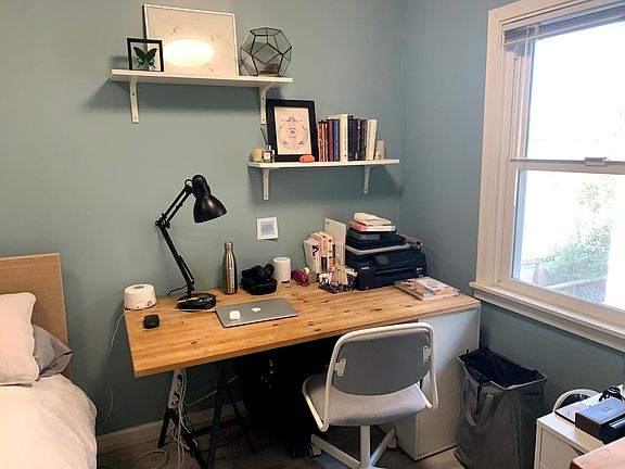 Desk to right of bed - could also place a dresser in this location