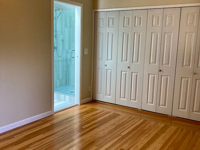 Primary bedroom with closet built-ins