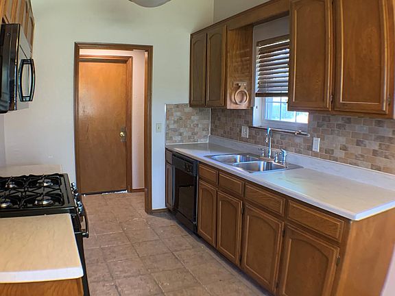 Updated kitchen with neutral countertops