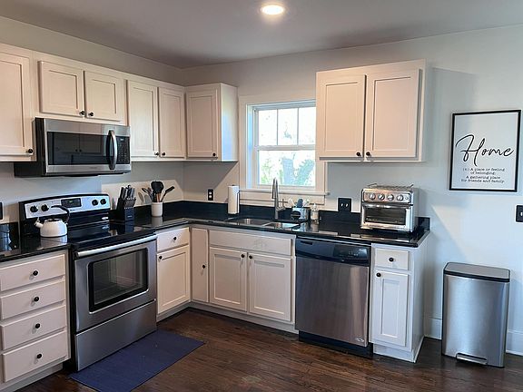 Kitchen with stainless steel appliances.