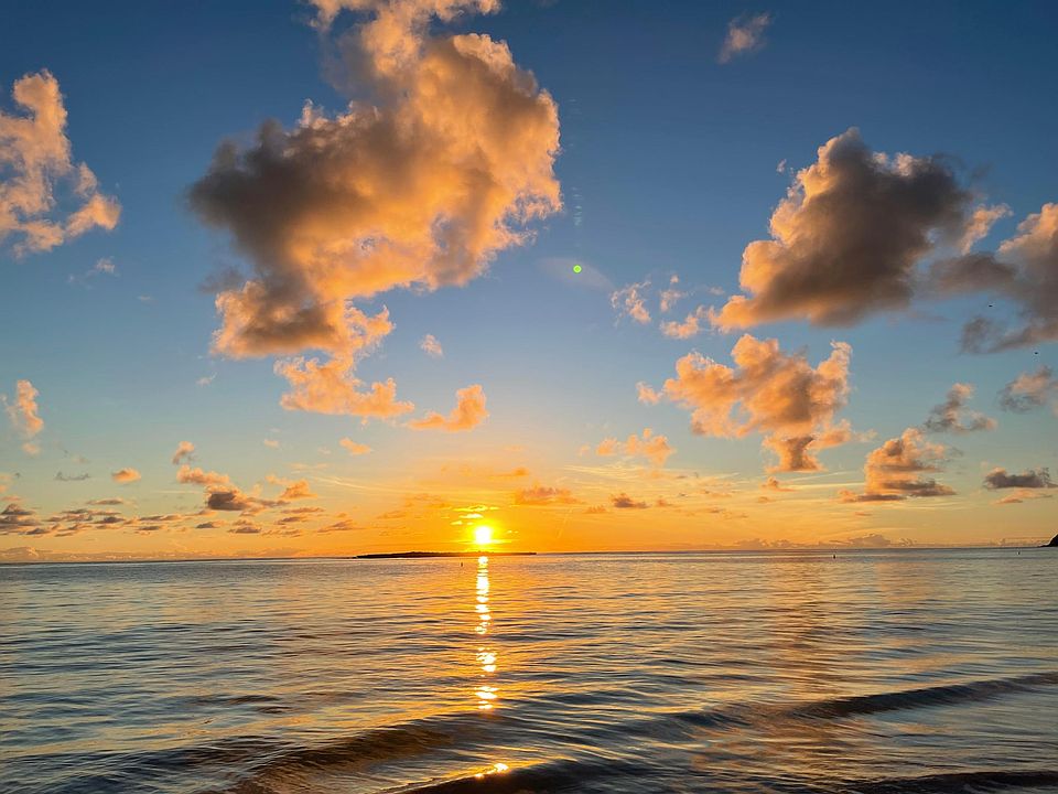 Kailua Beach, a 5 minute walk, has beautiful sunrises and moonrises.