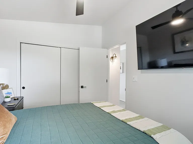 Bedroom 1 w/ TV.