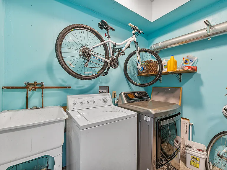Free laundry room access, shared with 1 other unit.