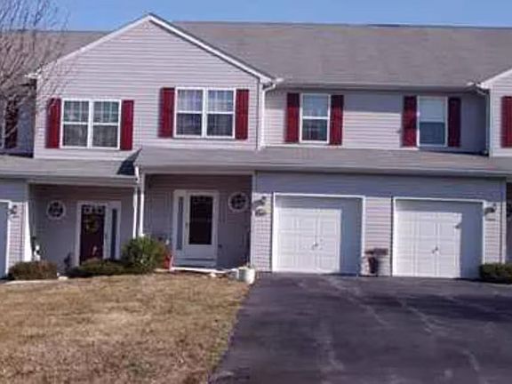 1 Car Garage with long driveway in a quiet neighborhood.