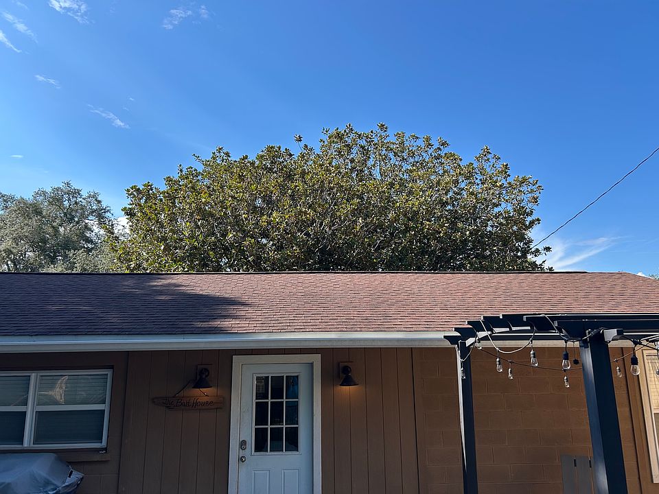 Entry is in the back by parking area with large deck