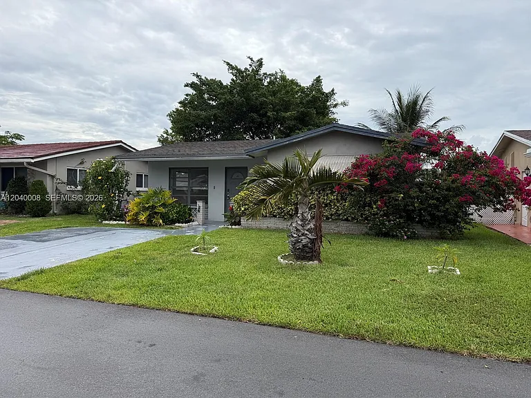 7311 NW 57th Dr — Photo 1