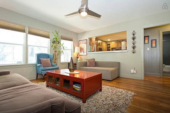 Living room with lots of natural light and custom shades