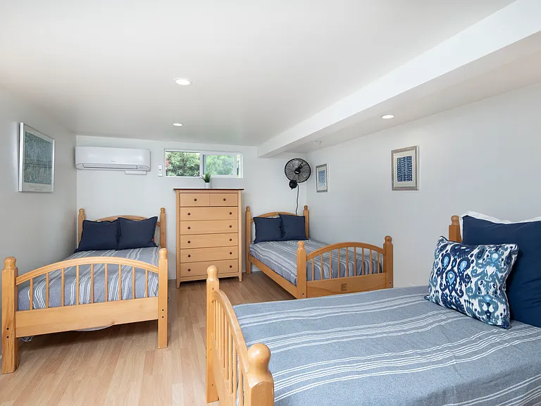 Bonus room with 4 twin size beds!! We are currently remodeling so the photo does not show all 4 beds! Great layout for families!