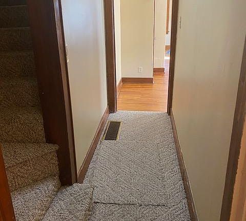 Hallway to bathroom and upstairs Both bedrooms are upstairs