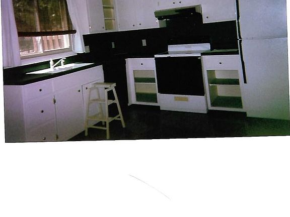 kitchen cab doors bk on after new hindges