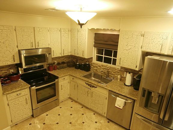 4th image of 6660 Tippin Ave