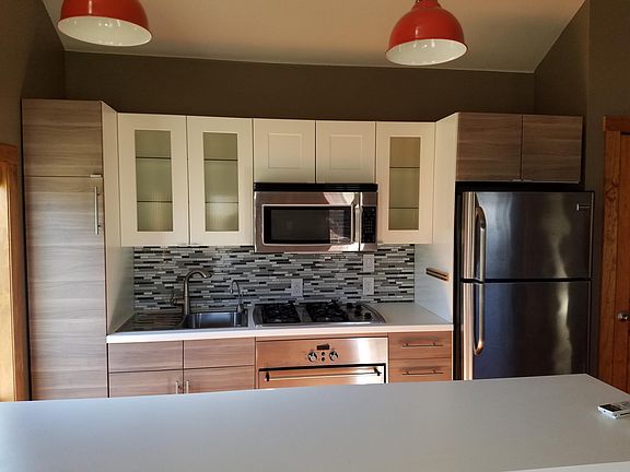Kitchen with microwave and disposal