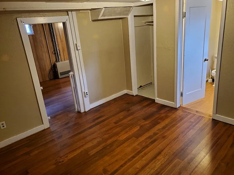 Downstairs living area with bathroom in rear
