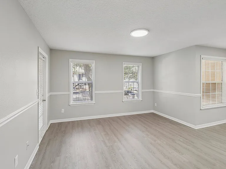 Spacious living area with natural light and modern finishes