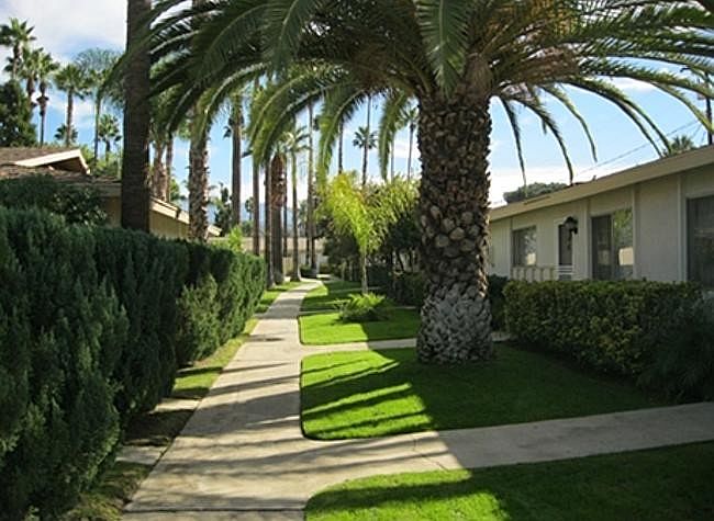 Single story units with lush landscaping