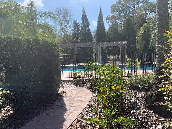 View of pool from front walk