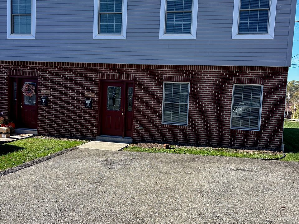 Outside of duplex. Entry for unit A is on left