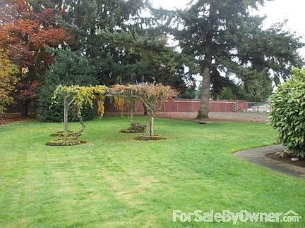 Beautifully Landscaped
						:
						Over one-half acre with grapes, fruit tress and underground sprinklers