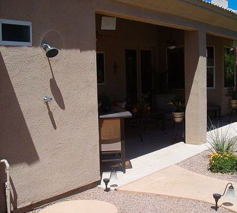 Outdoor shower to rinse off after a dip in the pool