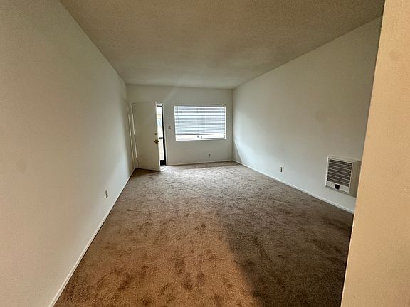 view of living room from dining
