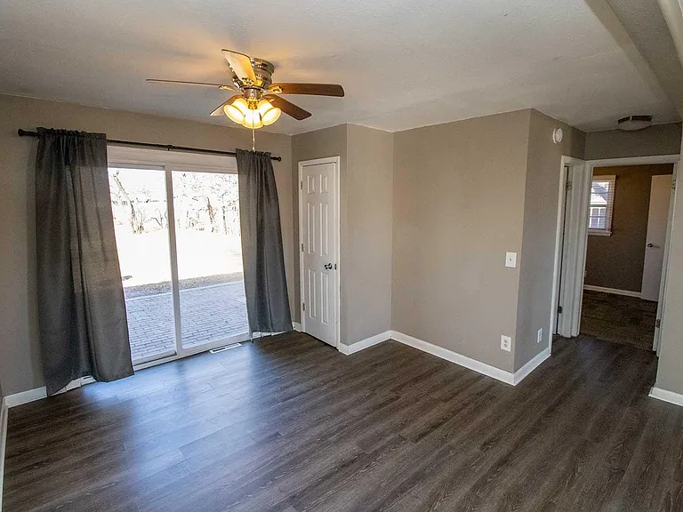 Newer sliding glass door and windows.