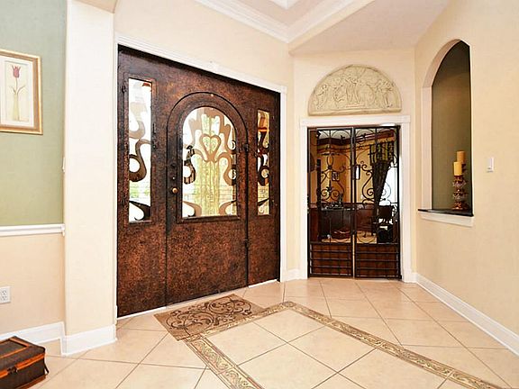 From the moment that you step into the entry you can see the custom work throughout the home. The cu