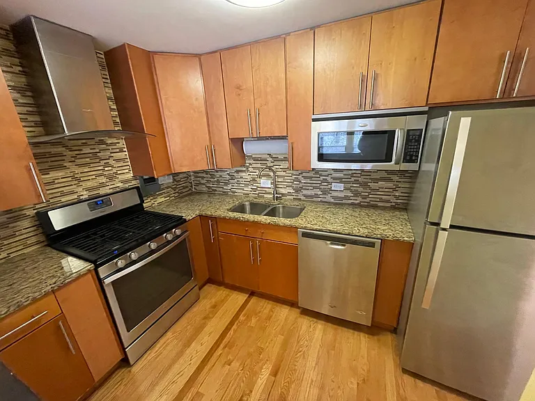 1450 E 55th Pl #318S — Photo 4