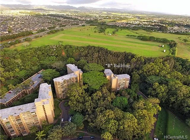 This apartment is in the smallest B building as seen in the photo so there are less tenants per floor, just 4 per floor so the tenants often become friends. Diamond Head, Waikiki and Honolulu are in the background. About 16 miles from HOnolulu.