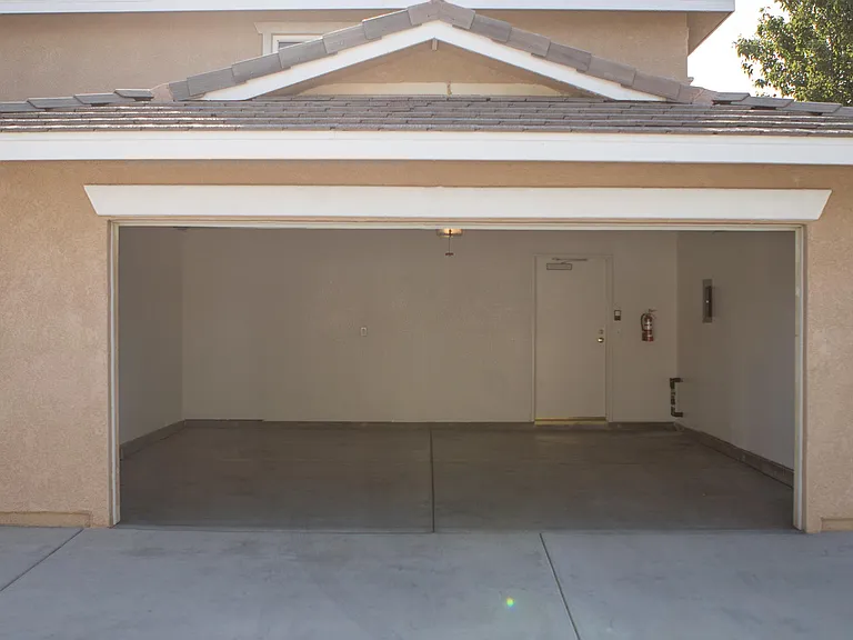 Full 2 car garage that leads into laundry room then kitchen