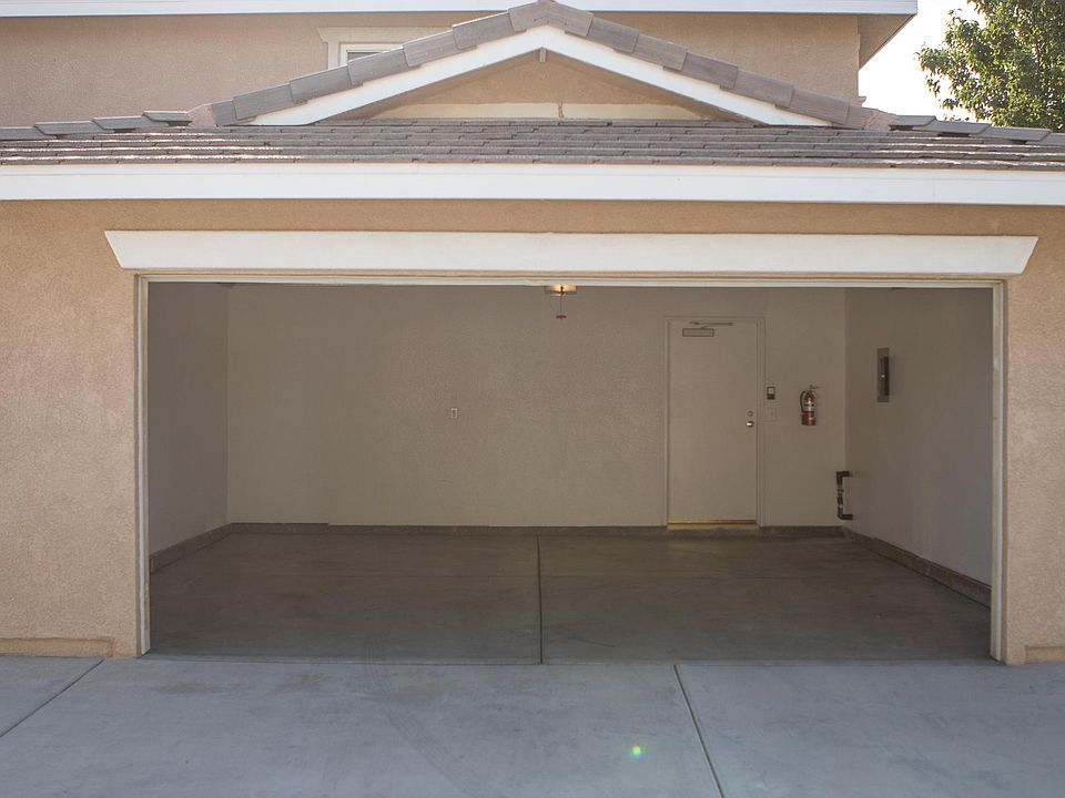 Full 2 car garage that leads into laundry room then kitchen