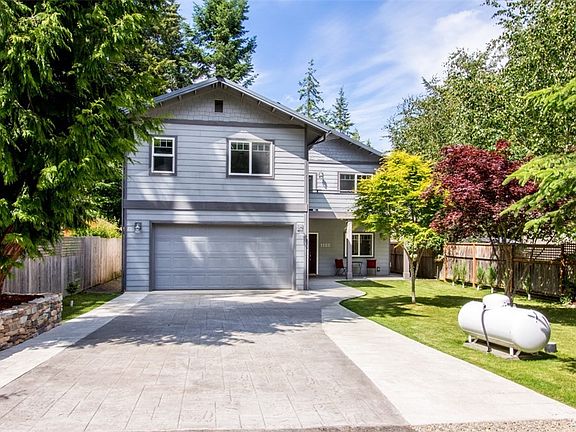 Expanded driveway leaves room for guest's vehicles.