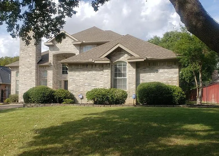 Great yard and trees with in-ground sprinkling system