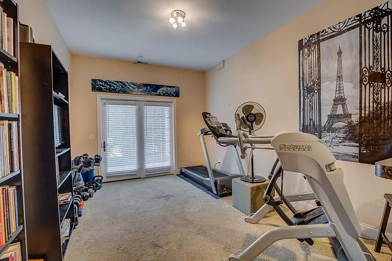 Fully finished lower level perfect for a home office, gym, media room, or guest suite