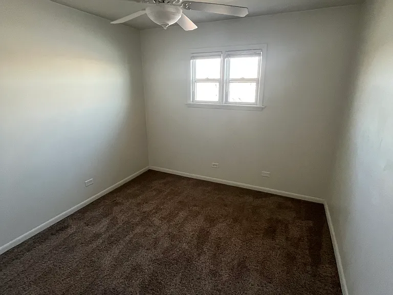 Bedroo with lake facing window