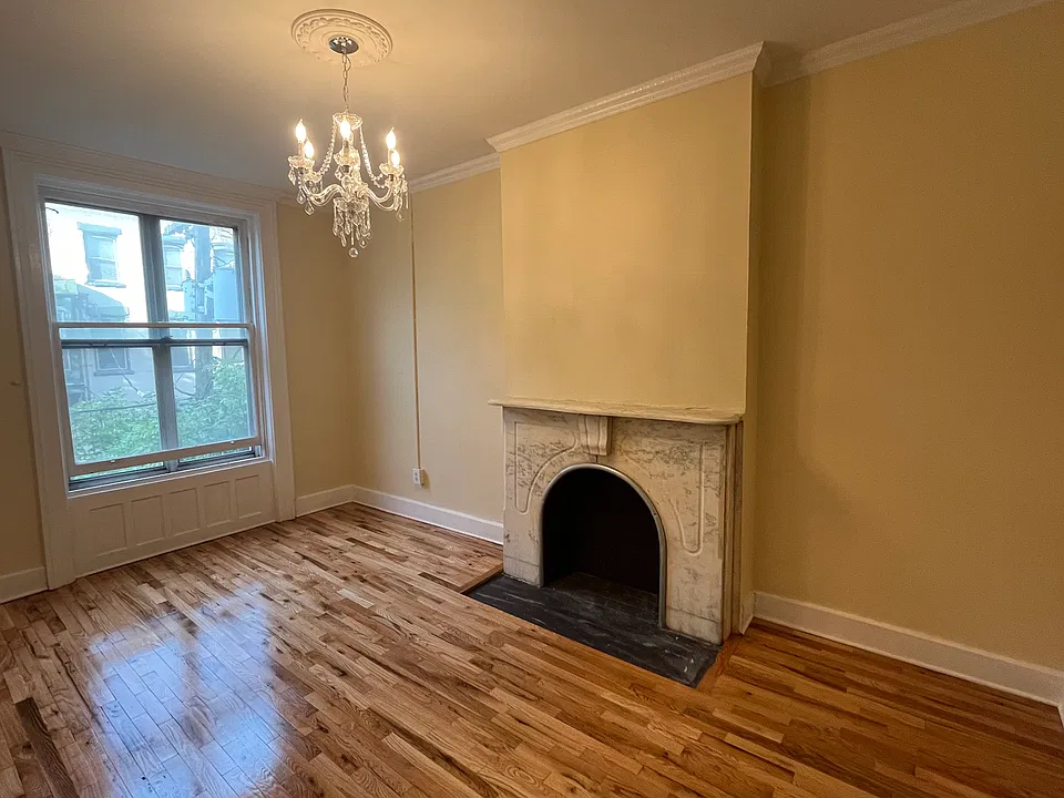 Living room, fireplace, chandelier