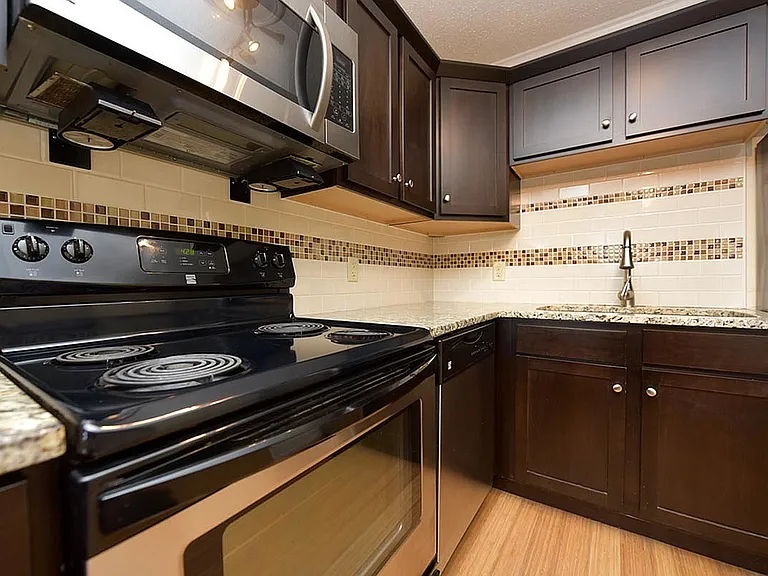 Step into luxury with this sophisticated kitchen setup, perfect for any culinary enthusiast.