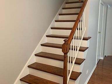 Stairs to upstairs bedrooms and bathroom