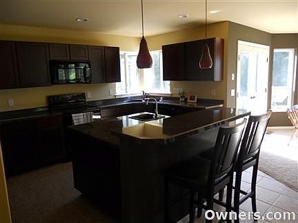 Kitchen with large island and breakfast bar