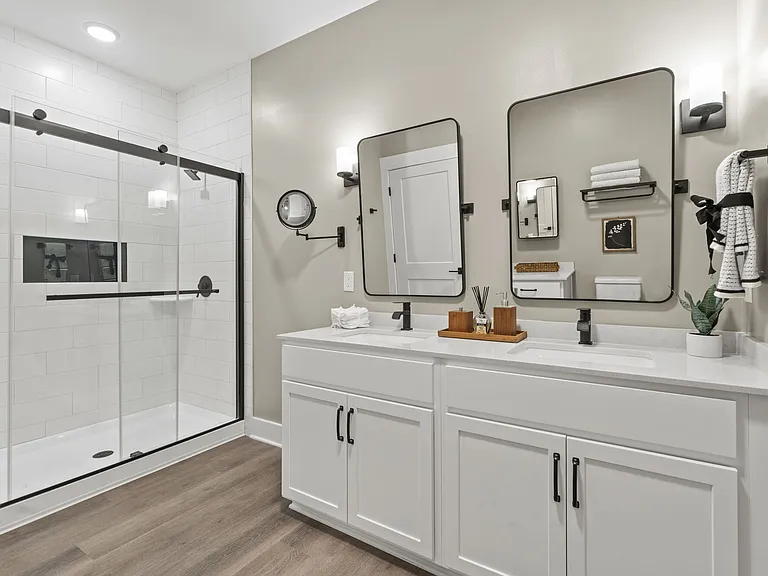 Indulge in a spa-like experience with our dual vanities with adjustable mirrors