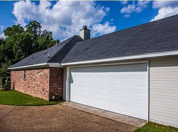 Side entry garage offers privacy