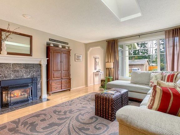 Family Room, w/ Marble Surround FirePlace