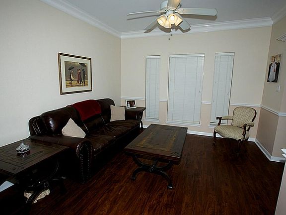 View of the formal living room looking toward the front windows