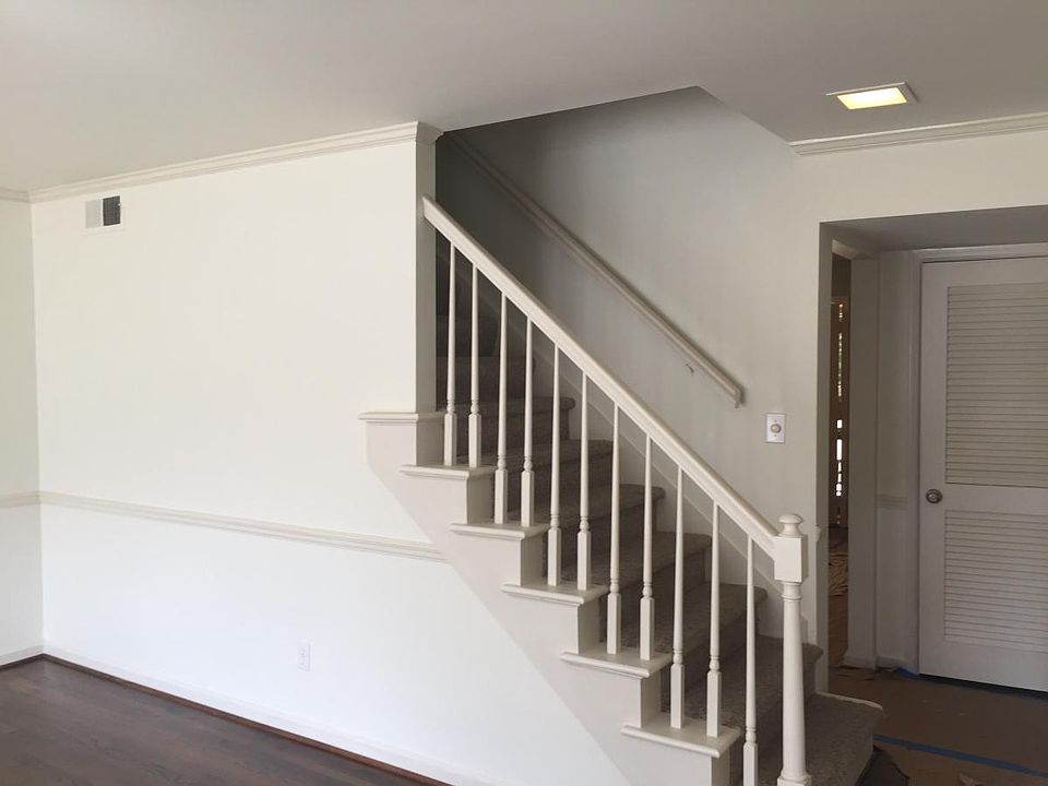 stairs leading to two bedrooms