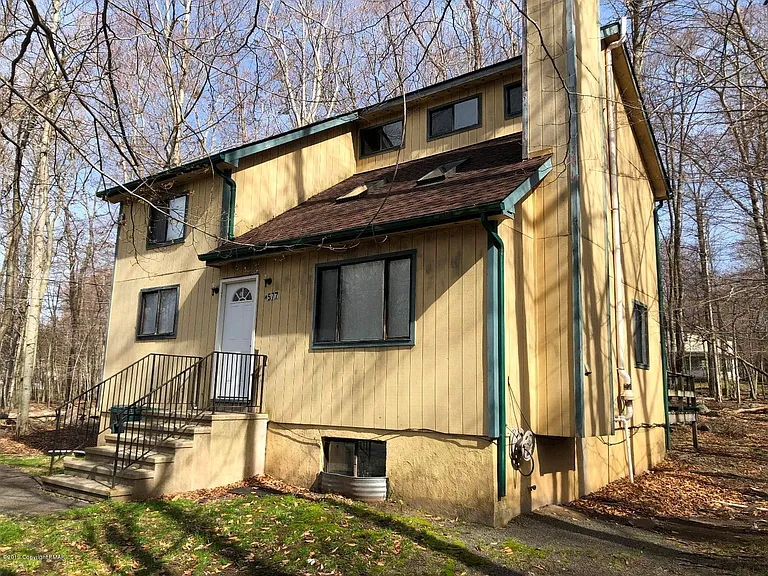 8900 Raccoon Trl — Photo 1