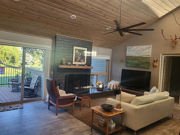 Living area with huge wood burningfireplace