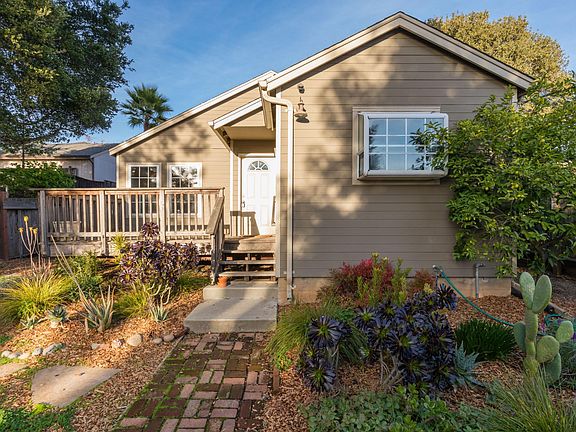 Landscaped front yard and front deck.