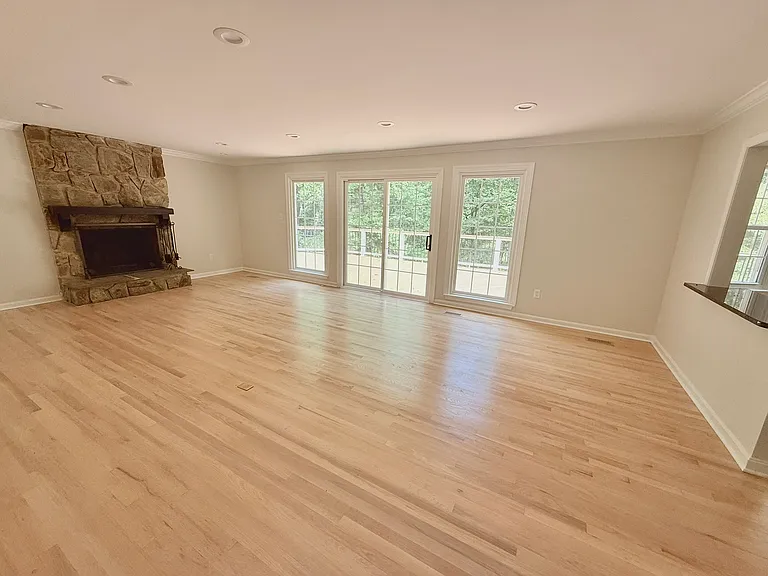 Family room connects to large deck and huge private yard